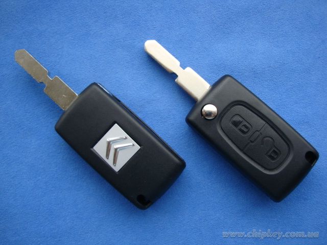 CITROEN выкидной ключ (корпус) 2 - кнопки , с креплением батарейки на корпусе ключа